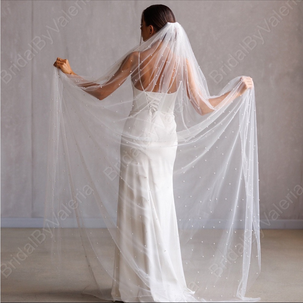 Light ivory pearl chapel length wedding veil
